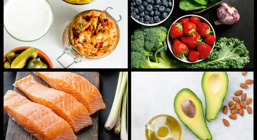 En samling livsmedel som utgör grunden för antiinflammatorisk kost: lax, bär, grönsaker, nötter och hälsosamma fetter.